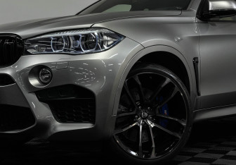 Подержанный автомобиль BMW X6 M 2016 года (27 фото)