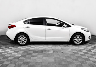 Подержанный автомобиль Kia Cerato Sedan 2013 года (4 фото)