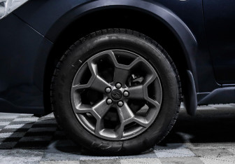 Подержанный автомобиль Subaru XV 2014 года (15 фото)