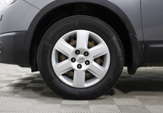 Подержанный автомобиль Nissan Qashqai+2 2011 года (13 фото)