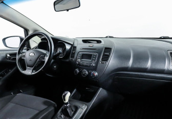 Подержанный автомобиль Kia Cerato Sedan 2013 года (7 фото)