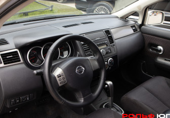 Подержанный автомобиль Nissan Tiida Sedan 2011 года (10 фото)