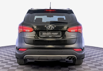 Подержанный автомобиль Hyundai Santa Fe 2014 года (6 фото)