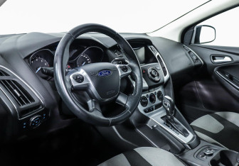 Подержанный автомобиль Ford Focus Sedan 2014 года (9 фото)