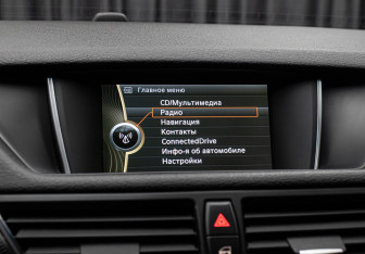 Подержанный автомобиль BMW X1 2013 года (21 фото)