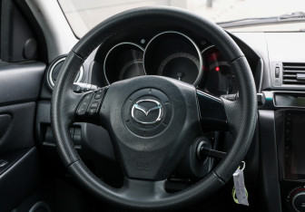 Подержанный автомобиль Mazda 3 Sedan 2008 года (16 фото)