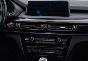 Подержанный автомобиль BMW X5 2016 года (14 фото)