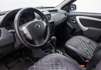 Подержанный автомобиль Nissan Terrano 2014 года (10 фото)