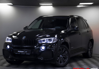 Подержанный автомобиль BMW X5 2015 года (26 фото)