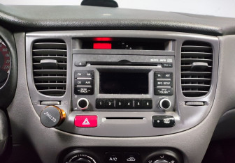 Подержанный автомобиль Kia Rio Hatchback 2010 года (14 фото)