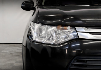 Подержанный автомобиль Mitsubishi Outlander 2014 года (17 фото)