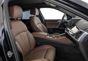 Подержанный автомобиль BMW X6 2025 года (24 фото)