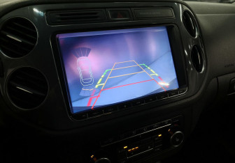 Подержанный автомобиль Volkswagen Tiguan 2015 года (14 фото)