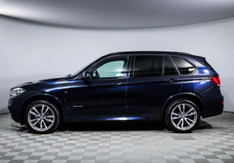 Подержанный автомобиль BMW X5 2015 года (8 фото)
