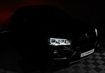 Подержанный автомобиль BMW X6 2016 года (20 фото)