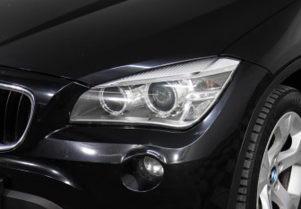 Подержанный автомобиль BMW X1 2014 года (7 фото)