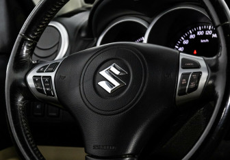 Подержанный автомобиль Suzuki Grand Vitara 2012 года (8 фото)