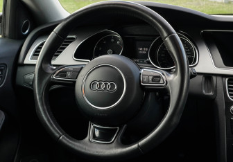 Подержанный автомобиль Audi A5 Coupe 2012 года (14 фото)
