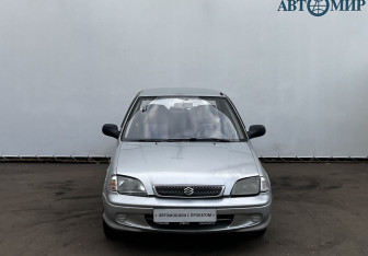 Подержанный автомобиль Suzuki Swift Sedan 2002 года (2 фото)