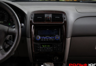 Подержанный автомобиль Mazda 626 Sedan 2001 года (12 фото)