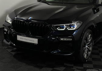 Подержанный автомобиль BMW X6 2021 года (22 фото)