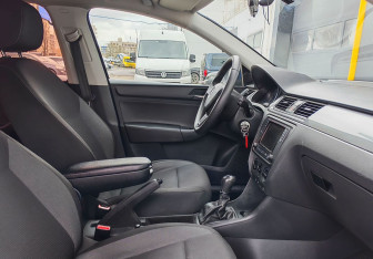 Подержанный автомобиль Skoda Rapid Liftback 2014 года (9 фото)