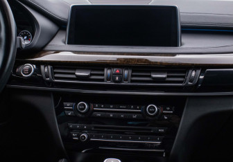 Подержанный автомобиль BMW X6 2018 года (14 фото)