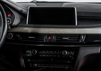 Подержанный автомобиль BMW X5 2015 года (13 фото)