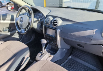 Подержанный автомобиль Nissan Almera Sedan 2014 года (11 фото)