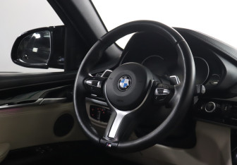Подержанный автомобиль BMW X6 2015 года (15 фото)