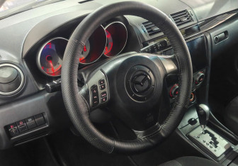 Подержанный автомобиль Mazda 3 Hatchback 2007 года (12 фото)