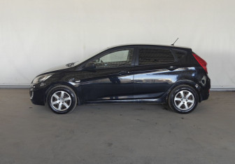 Подержанный автомобиль Hyundai Solaris Hatchback 2013 года (7 фото)