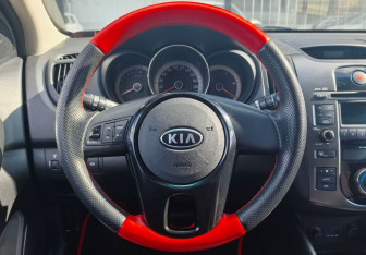 Подержанный автомобиль Kia Cerato Sedan 2012 года (14 фото)