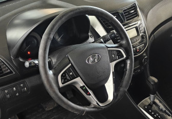 Подержанный автомобиль Hyundai Solaris Sedan 2013 года (12 фото)