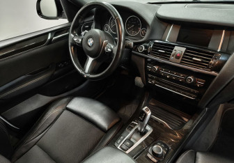 Подержанный автомобиль BMW X4 2016 года (10 фото)