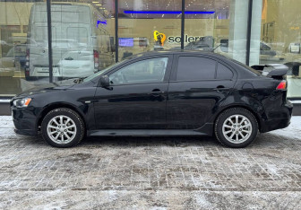 Подержанный автомобиль Mitsubishi Lancer Sedan 2012 года (5 фото)