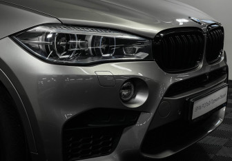 Подержанный автомобиль BMW X6 M 2016 года (23 фото)