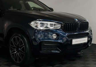 Подержанный автомобиль BMW X6 2018 года (20 фото)