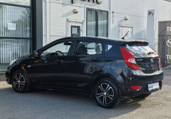 Подержанный автомобиль Hyundai Solaris Hatchback 2013 года (7 фото)