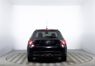 Подержанный автомобиль Peugeot 308 Hatchback 2010 года (6 фото)