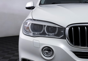Подержанный автомобиль BMW X5 2015 года (24 фото)