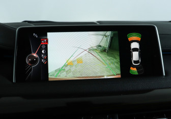 Подержанный автомобиль BMW X6 2014 года (18 фото)