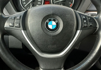 Подержанный автомобиль BMW X5 2010 года (15 фото)