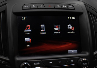 Подержанный автомобиль Opel Insignia Wagon 2014 года (18 фото)