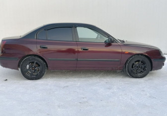 Подержанный автомобиль Hyundai Elantra Sedan 2004 года (4 фото)
