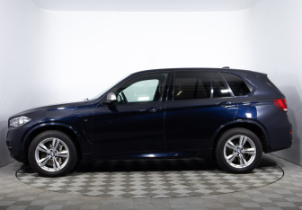 Подержанный автомобиль BMW X5 2014 года (8 фото)