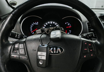 Подержанный автомобиль Kia Sorento 2014 года (18 фото)