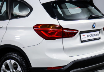 Подержанный автомобиль BMW X1 2016 года (16 фото)