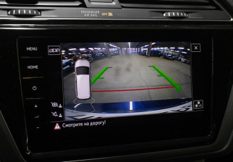 Подержанный автомобиль Volkswagen Touran 2019 года (21 фото)