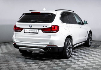 Подержанный автомобиль BMW X5 2014 года (5 фото)